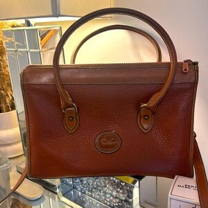Dooney & Bourke All Weather Leather Bag .
